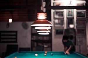 pool table lights hanging above pool table