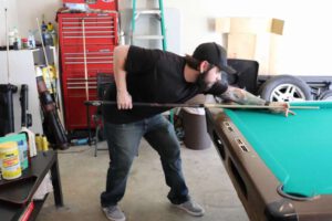 Lining up a shot on my pool table